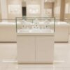 Jewelry display cabinet, glass showcase, glass product display cabinet, wooden frame, black-orange, 2 doors open.