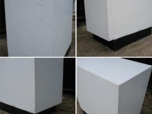 White wooden frame shelving unit with plastic shelves, 15 compartments.