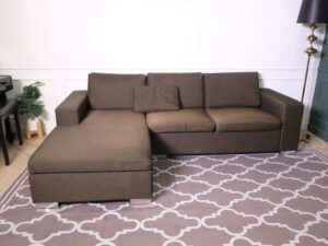 L sofa, 3 seats, wooden frame, steel legs, brown, brand Dry Clean Only.