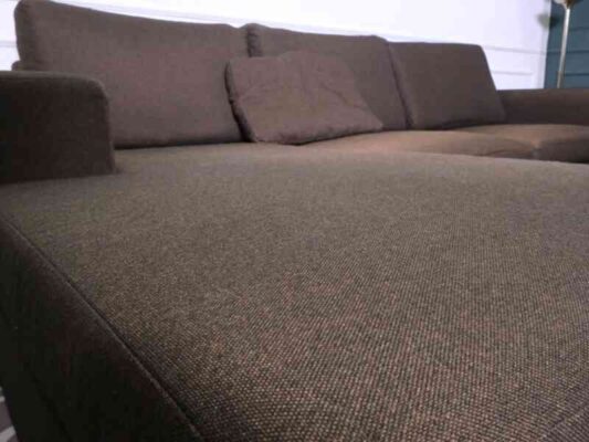 L sofa, 3 seats, wooden frame, steel legs, brown, brand Dry Clean Only.