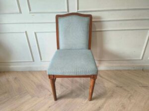 Light blue fabric wooden chair, beautiful design.
