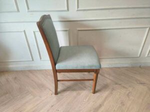 Light blue fabric wooden chair, beautiful design.