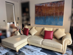 3-seat L-shaped corner sofa, wooden frame, leather cushion, cream color, with pillows