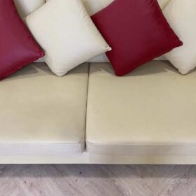 3-seat L-shaped corner sofa, wooden frame, leather cushion, cream color, with pillows