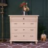 Storage cabinet with 4 drawers, wooden frame, cream color, European work from Germany.