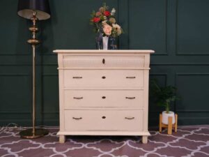 Storage cabinet with 4 drawers, wooden frame, cream color, European work from Germany.