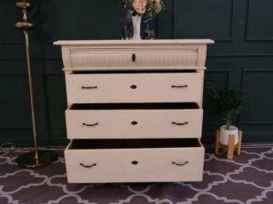 Storage cabinet with 4 drawers, wooden frame, cream color, European work from Germany.