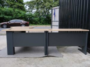 Executive desk set, 3 pieces connected together, steel legs, cream color, Rockworth brand.