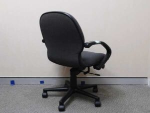Office chair with gray fabric cushion, brand UB-Haworth.