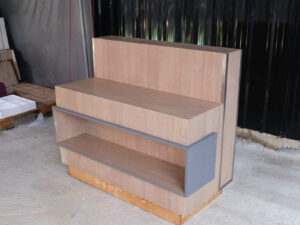 Product shelf, display stand, 1 side, wooden frame, brown wood pattern, has 1 compartment.