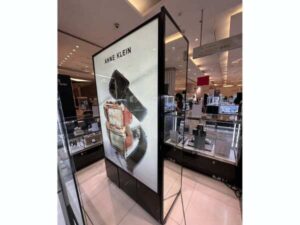 Light Box, product advertising sign, tall lighted sign on 2 sides, one side is a mirror.