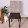 An all-wood chair with a beautiful frame and a chic woven rope backrest.