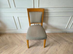 Wooden chair, cream colored fabric cushion, beautiful design.