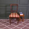 Striped chair, cream/red fabric cushion, European work from Germany.