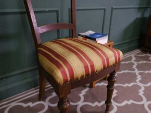 Striped chair, cream/red fabric cushion, European work from Germany.
