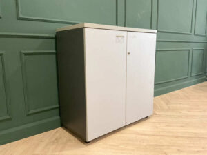 Filing cabinet, storage cabinet, wooden frame, white surface.