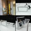 Shaving mirror in the bathroom, wall mounted, has built-in lights, steel cantilever legs.