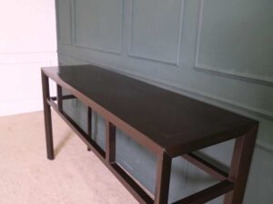 Multi-purpose wooden table Rectangular shape, dark brown.