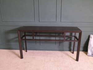 Multi-purpose wooden table Rectangular shape, dark brown.