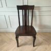 Whole chair made of wood, beautiful frame, dark brown.