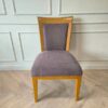 Wooden chair, gray fabric cushion, beautiful brown frame. The backrest has a cushion.