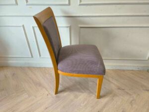Wooden chair, gray fabric cushion, beautiful brown frame. The backrest has a cushion.