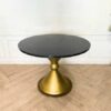 Round table, stainless steel legs, gold color, black wooden top