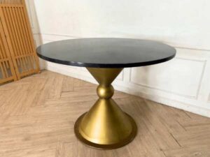 Round table, stainless steel legs, gold color, black wooden top