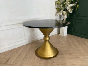 Round table, stainless steel legs, gold color, black wooden top