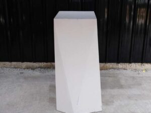 Pallet Tall product display stand with white wooden frame all over.
