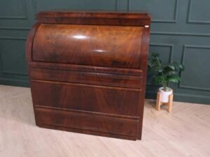 Cylindrical wooden storage cabinet, antique style, European work from Germany.
