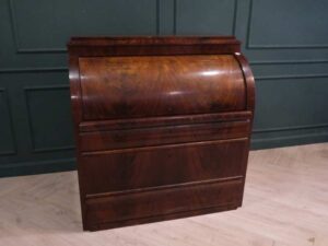 Cylindrical wooden storage cabinet, antique style, European work from Germany.
