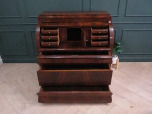 Cylindrical wooden storage cabinet, antique style, European work from Germany.