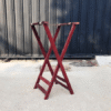 Red wooden tray stand