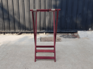 Red wooden tray stand