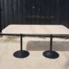Dining table, black round steel legs, cream wood top, 160 x 80 cm.