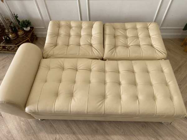 2-seat sofa bed, leather cushion, cream color