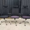 Office chair, purple fabric cushion, mesh backrest, black headrest