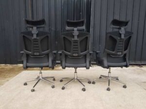 Office chair, purple fabric cushion, mesh backrest, black headrest