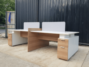 Group of 4 work tables with 2 drawer filing cabinets