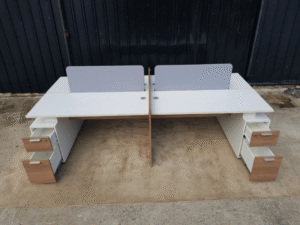 Group of 4 work tables with 2 drawer filing cabinets