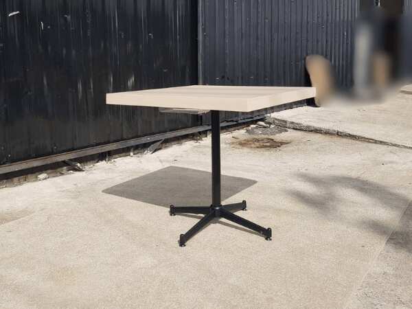Dining table, steel legs, wooden top, cream color, 80 x 80 cm.