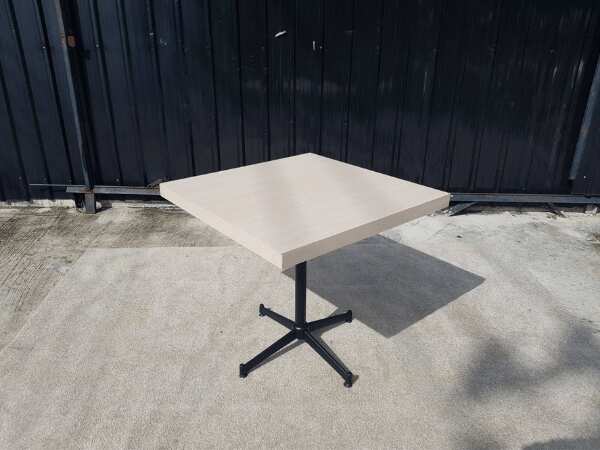 Dining table, steel legs, wooden top, cream color, 80 x 80 cm.