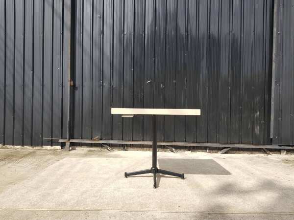 Dining table, steel legs, wooden top, cream color, 80 x 80 cm.
