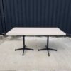 Dining table, steel legs, wooden top, cream color, 160 x 80 cm.