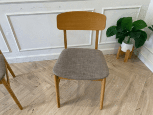 Gray wooden chair with fabric cushion, modern style