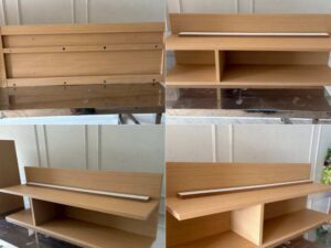 Wall-mounted storage cabinet with doors and shelves.