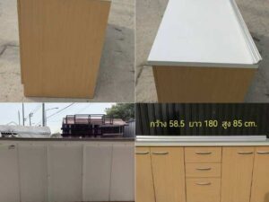 Wall-mounted storage cabinet with doors and shelves.