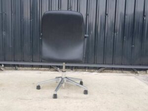Office chair, steel legs, leather seat, black backrest, Rockworth brand.