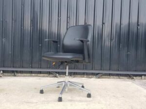 Office chair, steel legs, leather seat, black backrest, Rockworth brand.